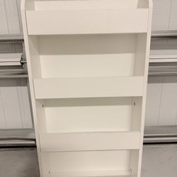 Selling wooden magazine rack, 29.5” tall.
