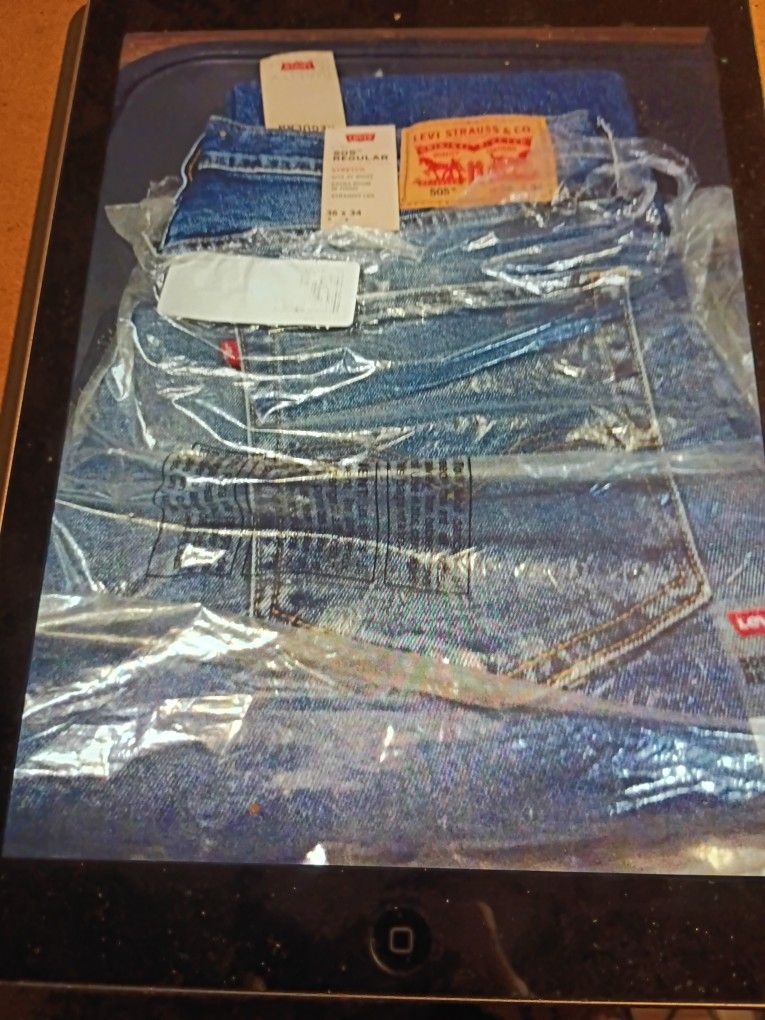 LEVI STRAUSS & CO 505 STYLE JEANS 36 W. L34