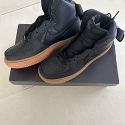 Women’s Black Air Force Ones high tops