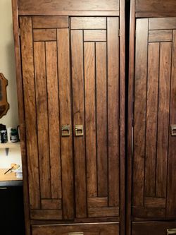 Large Wooden Armoire with Brass Hardware