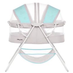 Dream On Me Karley Bassinet In Blue/Grey  Open box item   INVENTORY NUMBER: 10(contact info removed)0