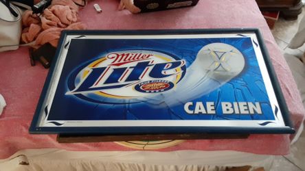 Miller lite glass picture and frame.