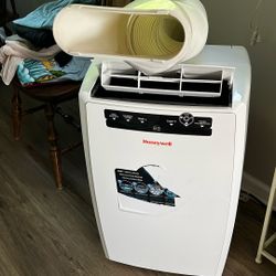 Air conditioner portable Honeywell works great have central don’t need it