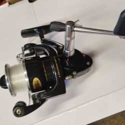 MITCHELL FISHING REEL