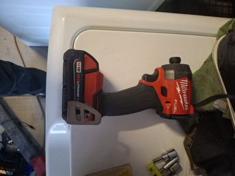 MILWAUKEE IMPACT DRILL BRAND NEW WITH BATTERY