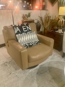 Caramel tan, leather, swivel chair, chrome base