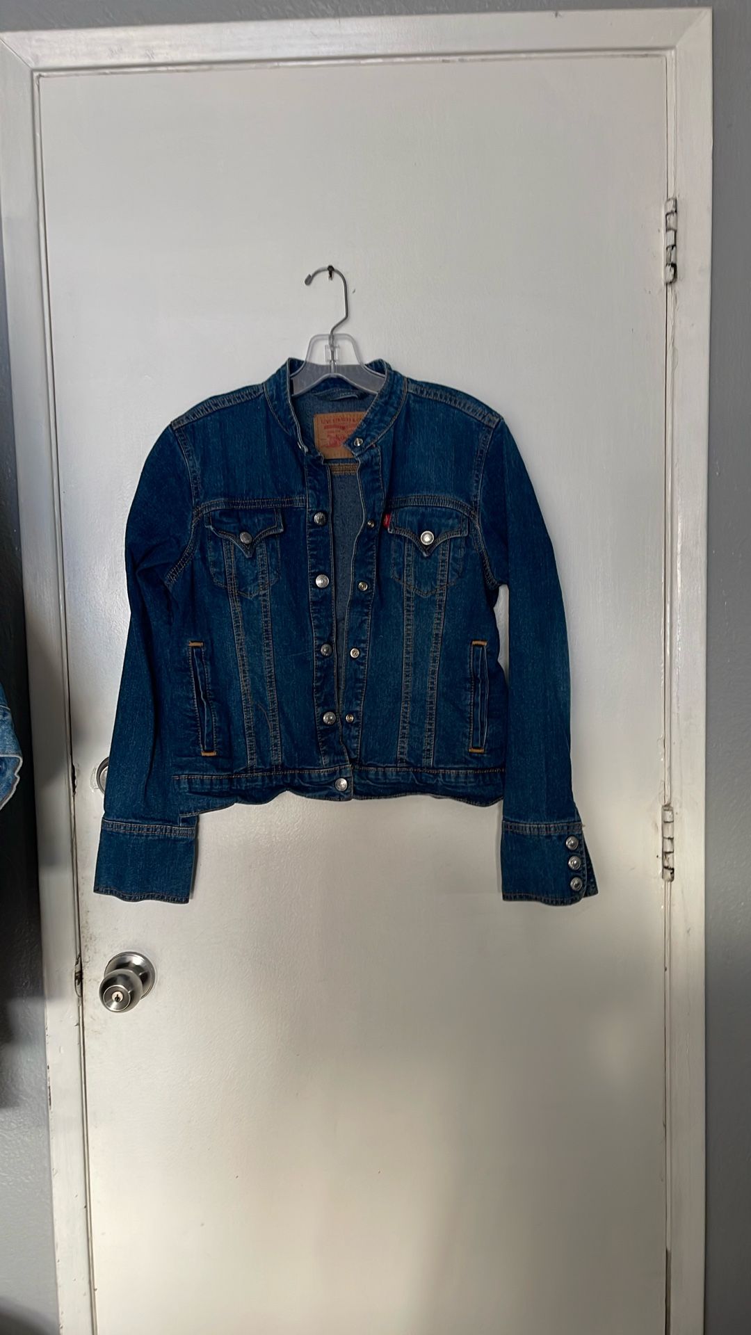 Levi Jacket Size Petite/Medium Never Worn .