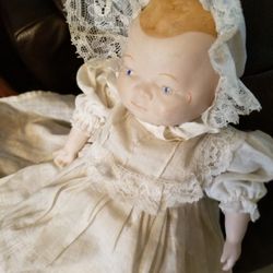 Antique Porcelain Doll In Original Clothes