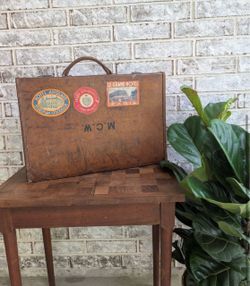 Vintage Leather Suitcase with Hotel Travel Stickers