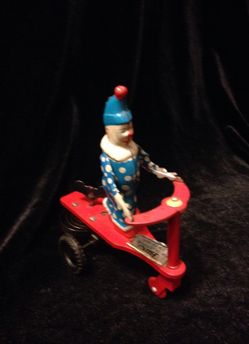 Vintage Clown Riding Scooter