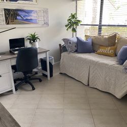 Metal Daybed With wicker Trim On Sides. Upgraded Mattress to Sealy So Extra Comfort.. Excellent Condition.