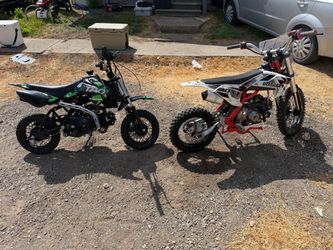 2 dirt bikes