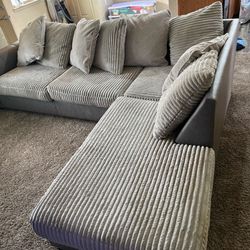 Clairette Gray Court 2-Piece Sectional with Chaise by Ashley Furniture.