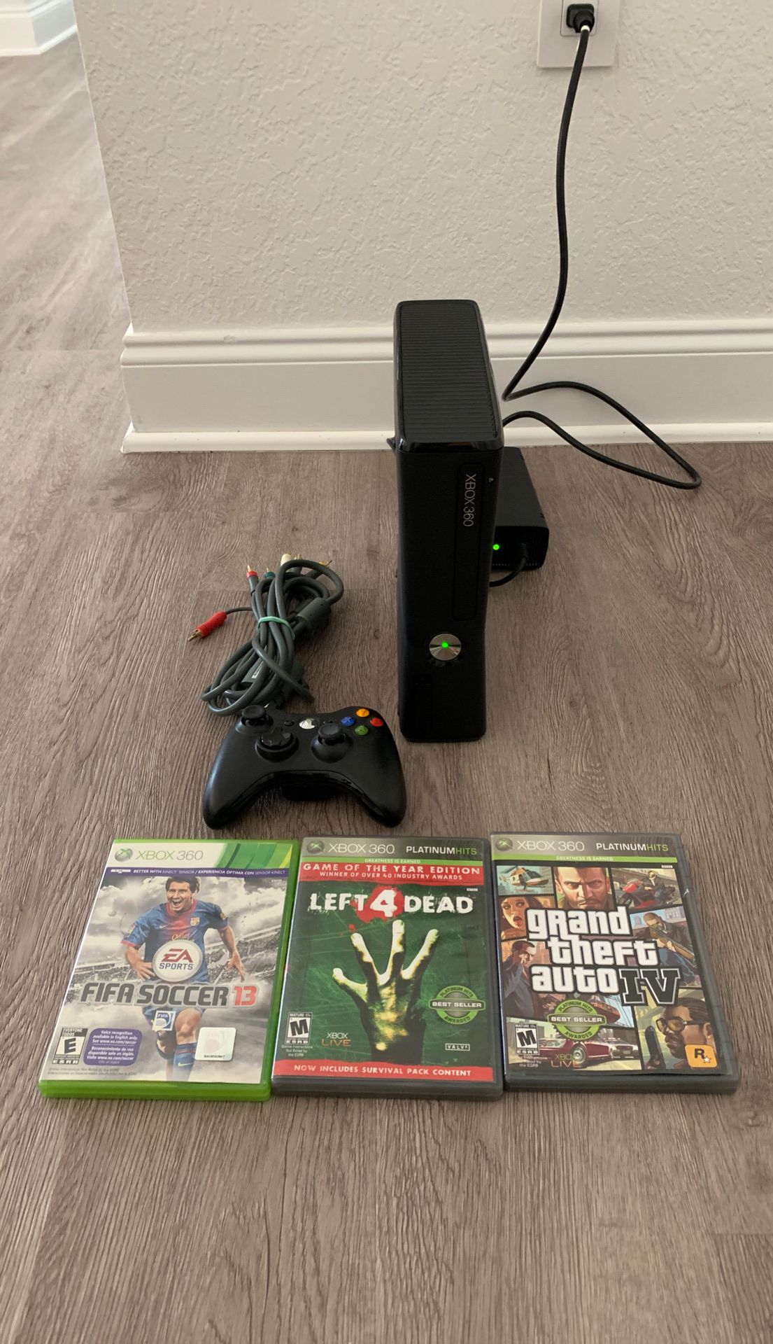 XBOX 360 w/ Cables, controllers, and 3 games