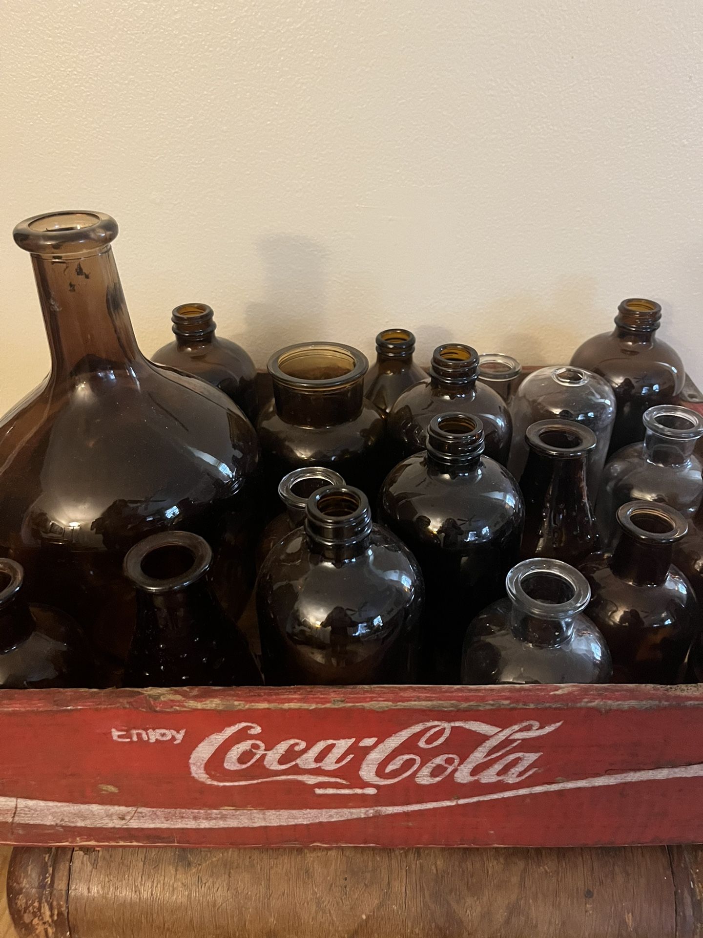 Collection Of amber Glass Bottles And Clear Glass