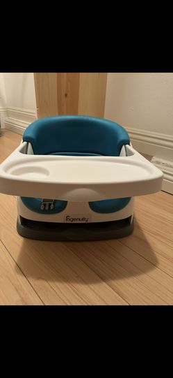 Ingenuity Baby Base 2-in-1 Booster Seat (in teal/blue).