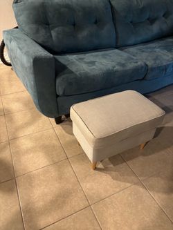 Comfortable sofa and ottoman , great excellent condition