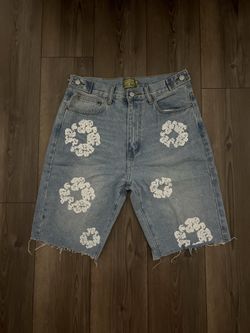 Light Denim Tear Shorts
