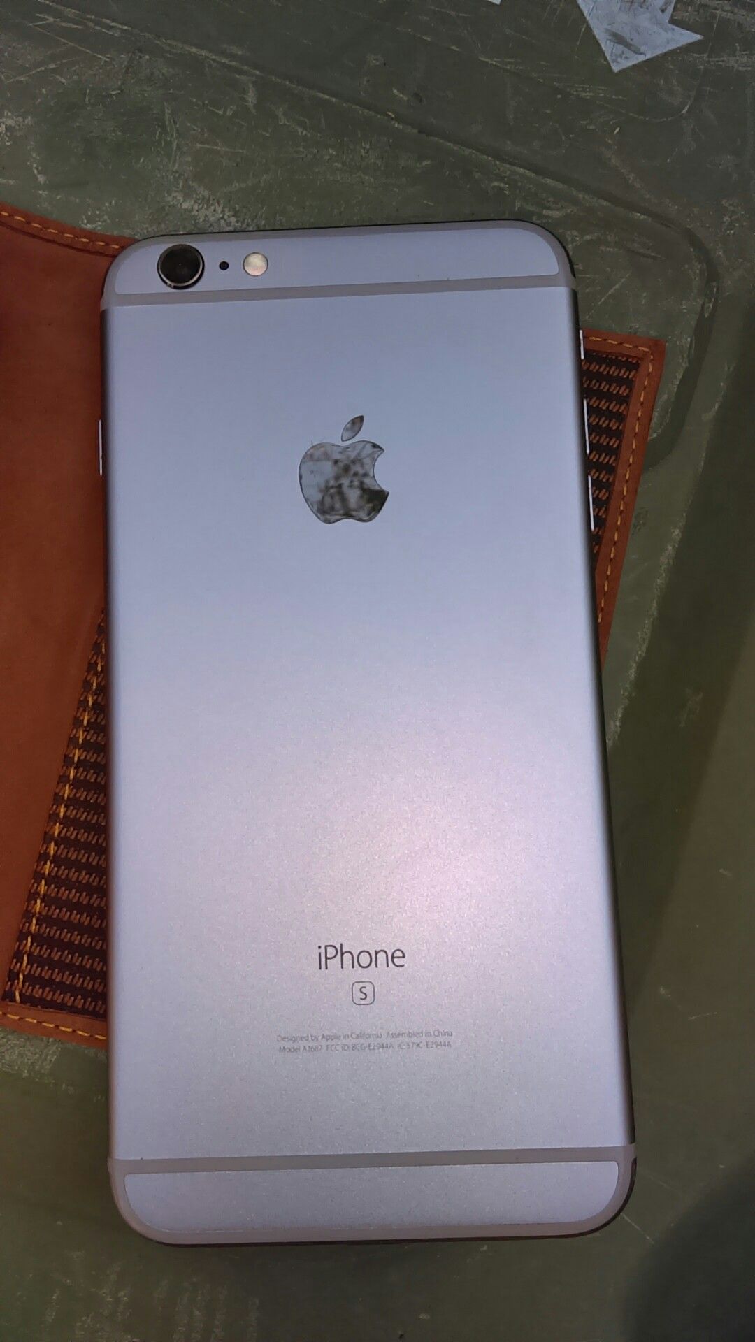 IPhone 6S Plus. T mobile. 64gb. Locked by password! Small crack on top screen.