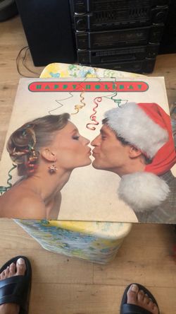 Happy Holiday Vinyl Record with Various Artists including Johnny Mathis, Barbara Streisand, Tony Bennett, etc.