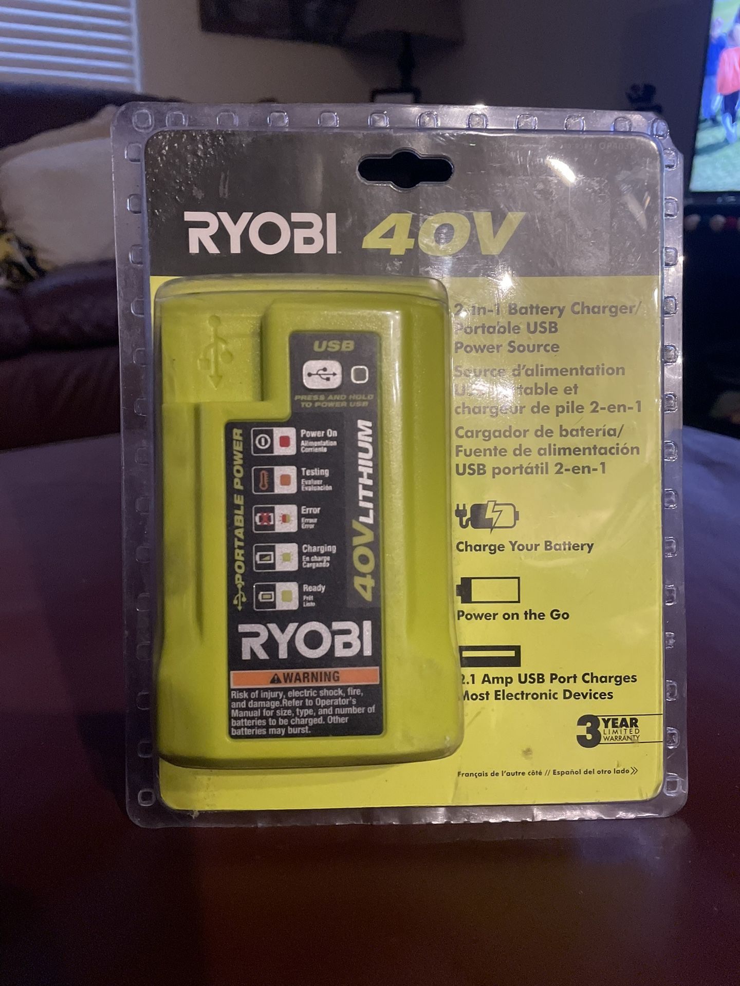 The Ryobi OP403A 40V 2-in-1 Battery/USB Charger 