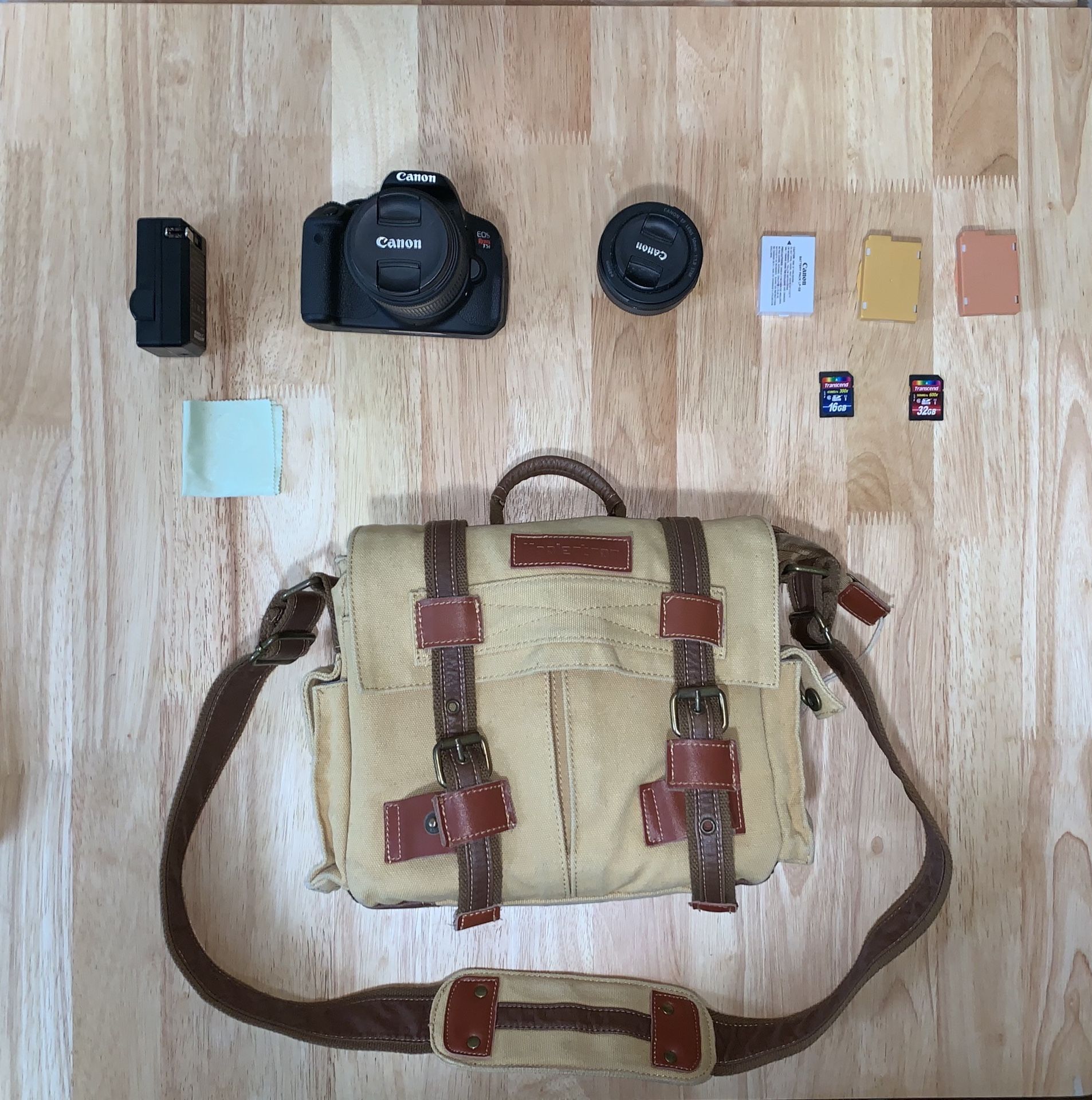 Canon Rebel T5i w/ 2 lenses, 3 batteries, 2 SD cards, and a Camera Bag