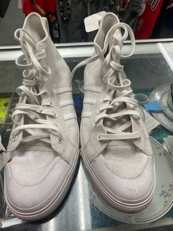 Size 14.  White Adidas Bravada 2.0 Canvas Mid cut sneaker