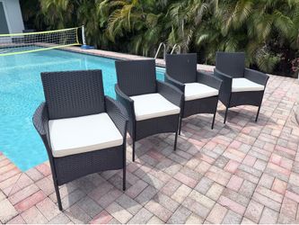Outdoor 4 PCS Rattan Resin Wicker Dining Patio Cushioned Chair w/Zipper. Black chair. Beige cushions