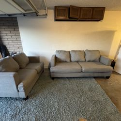 Living Spaces Gray Twin Set Sofa Loveseat 