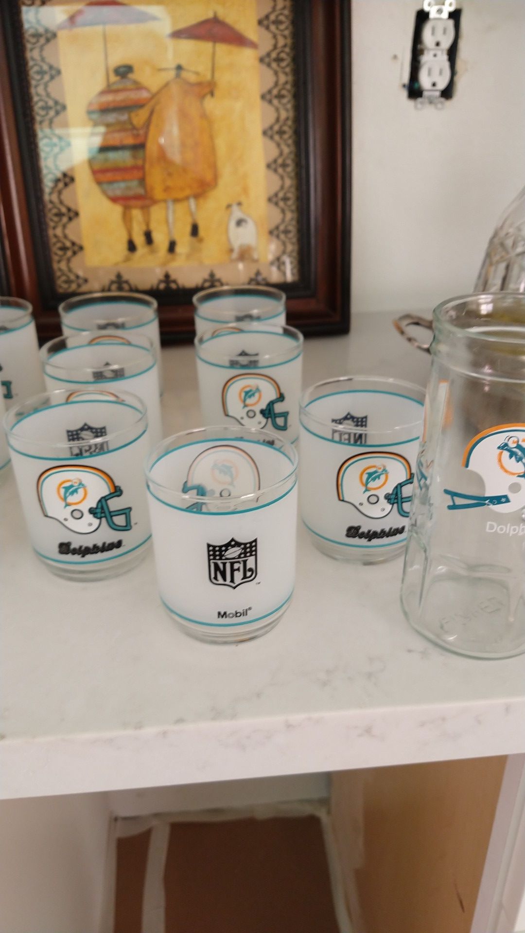 Collectable NFL Dolphin glasses - 11 total