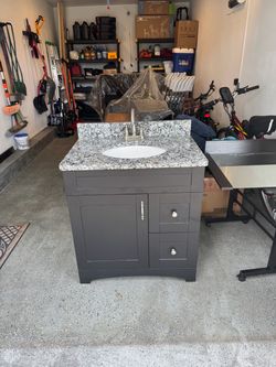 Gray Bathroom Vanity with Granite Top, Sink and mirror