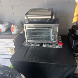 Selling fire pit table with air fryer and George foreman grill all for $100
