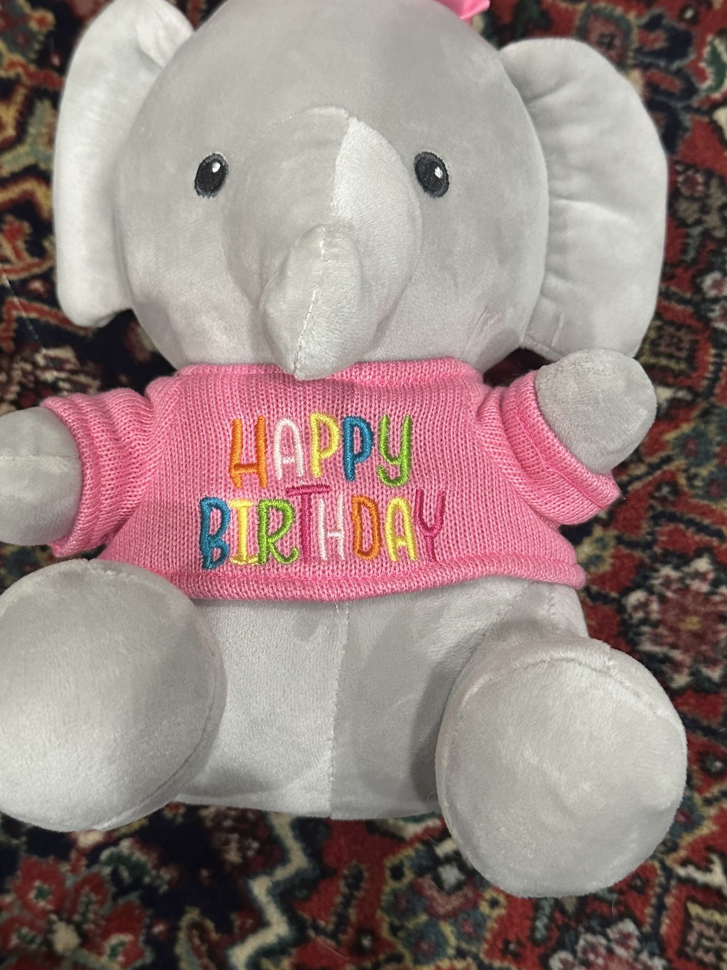Linzy toy gray elephant stuffed animal. Sings happy birthday. 10”