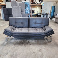 Futon leather Couch (Free Delivery)
