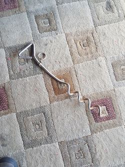 Stake and tie down. Used for dogs.