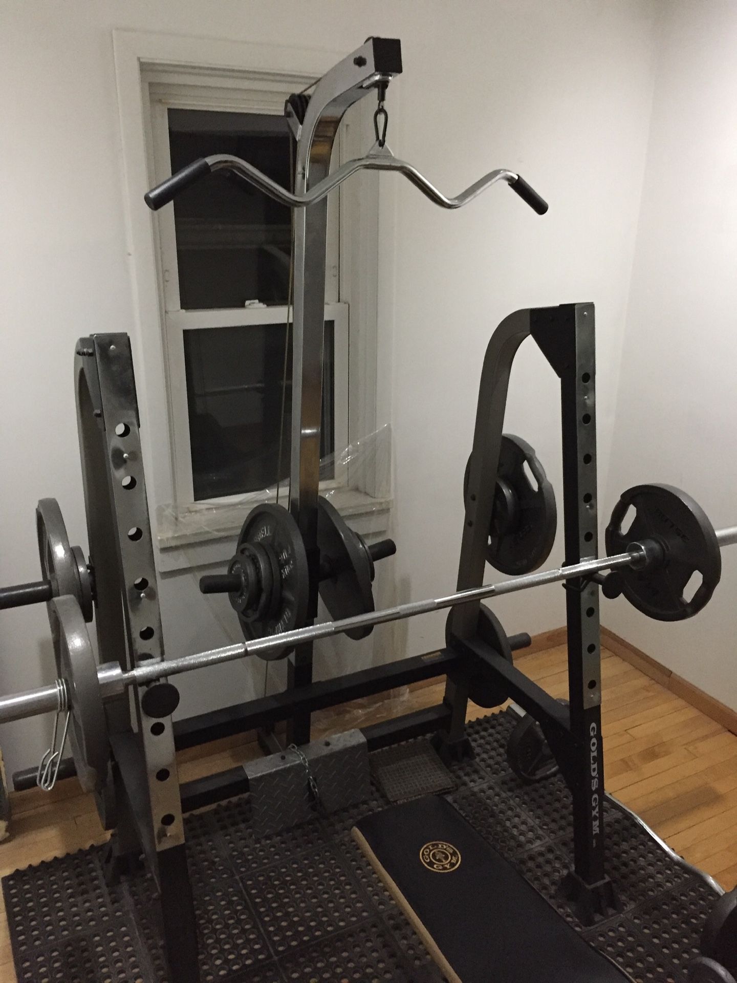 Olympic gym equipment with 600 lbs. in weights