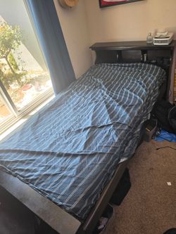 Twin bed with solid wood frame