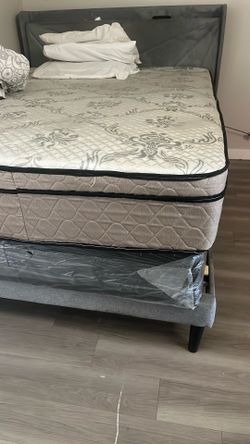 Queen mattress and box spring along with bed frame