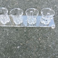 Four Plastic Shot Glasses