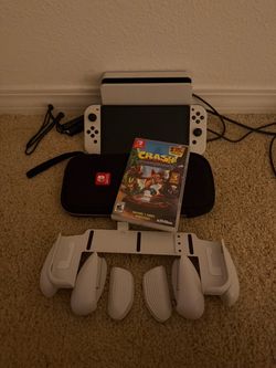 Nintendo Switch (OLED) + extras