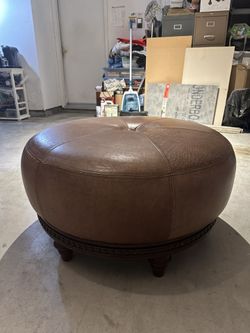 Bombay Co. Round Faux Leather Footed Ottoman, 18" x 33.5"