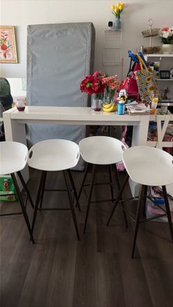 Long table with 4 chairs