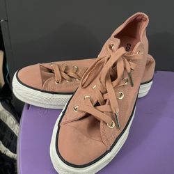Pink/rose Gold Converse.