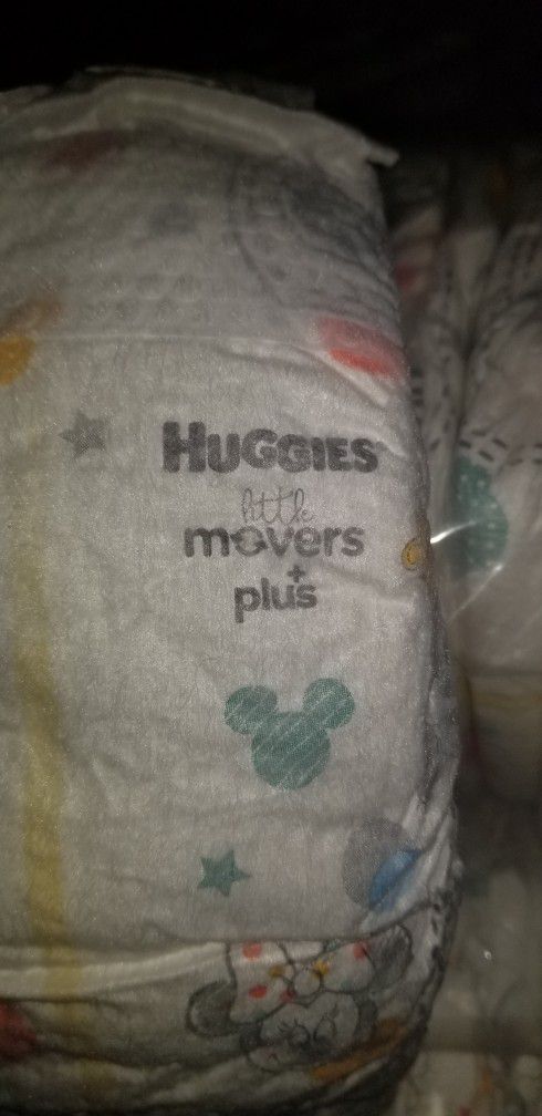New Huggies 5T Movers Plus Diapers - Opened Package