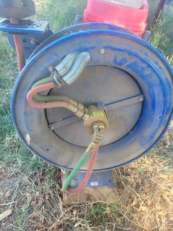 Oxy acetylene, hose real. Cutting Torch.