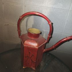 Red Metal Watering Can 

