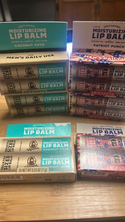 Dr. Squatch natural moisturizing lip balms in Coconut Cove and Patriot Punch scents.