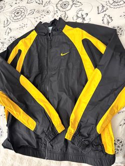NOCTA Nike Black and Yellow Windbreaker Jacket