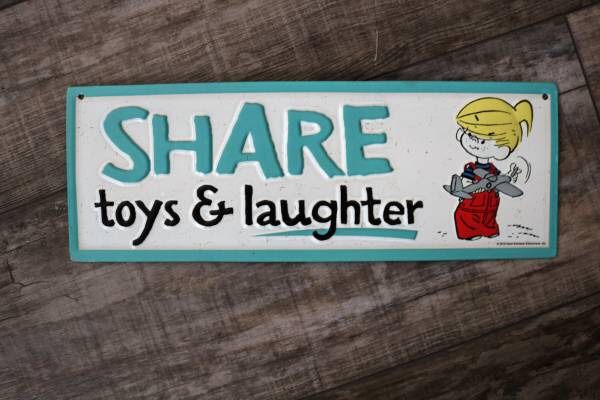 12in collectible "Share Toys & Laughter" Embossed Licensed Tin Sign. Dennis The Menace 2015 Comic Ketcham. 12.36" x 4.35".Pick up in East Pearland ne
