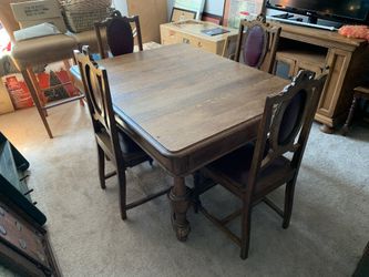 Antique dining table and chairs